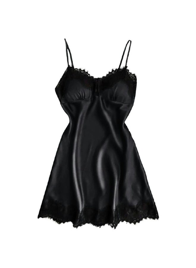 A short satin nightgown decorated with a black dress
