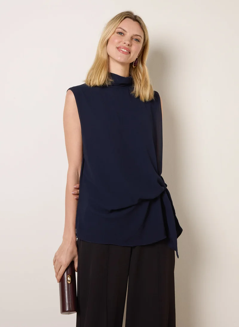 بلو فانيلا Sleeveless Cowl Tie Front Chiffon Blouse