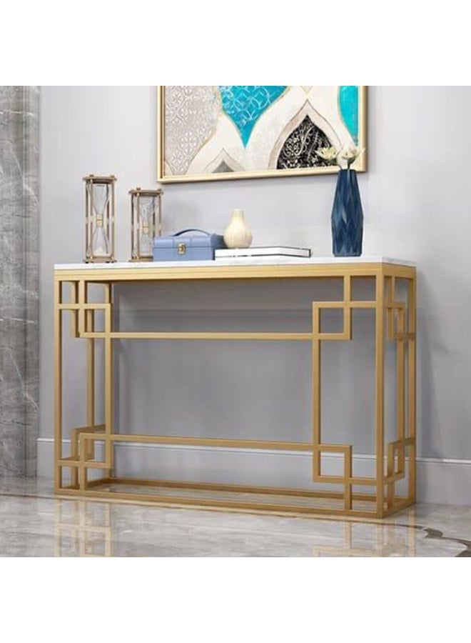 Modern console with golden steel frame and black marble top