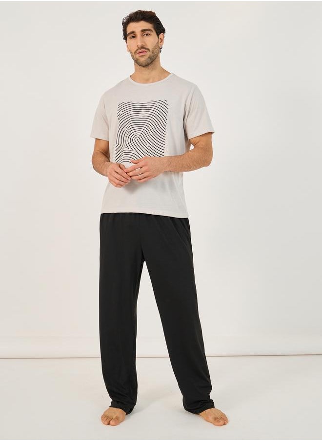 Styli Styli Graphic Print Round Neck T-Shirt and Pyjama Set  - Image 1