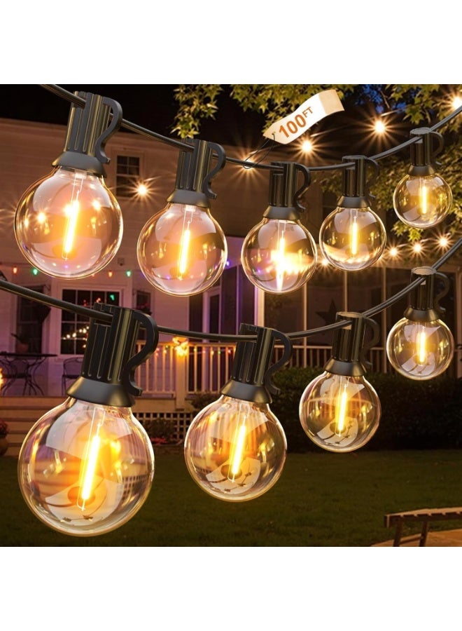 يوڠام أضواء فيستون خارجية بطول 30.5 متر / 100 قدم، 50 لمبة + 2 لمبات احتياطية، لمبات LED G40، أبيض دافئ، مقاومة للكسر والماء، قابلة للتوصيل، أضواء معلقة للمنزل، الحديقة الخلفية، الحدائق، الشرفات، والخيام - Image 1