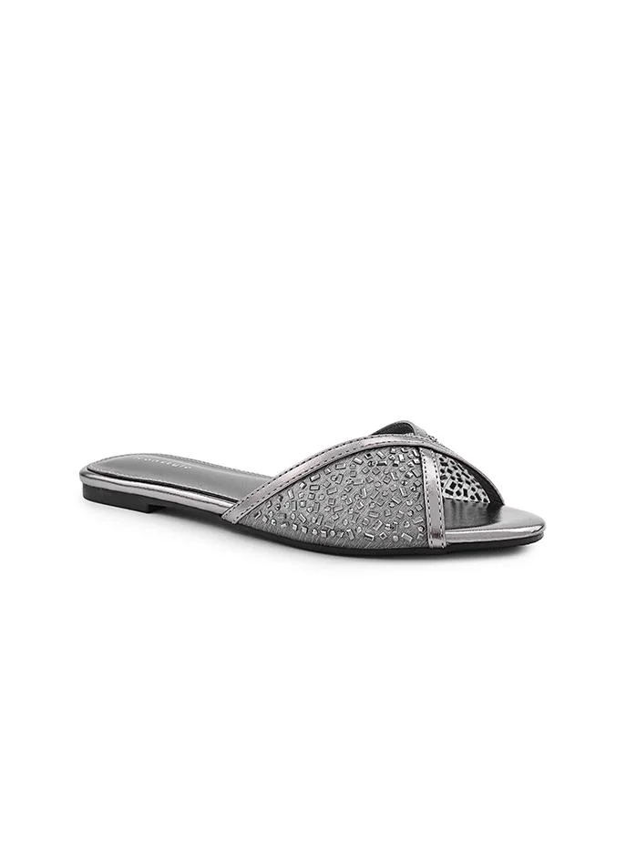 أيقون Iconstyle flat sandal with shiny inspired design.