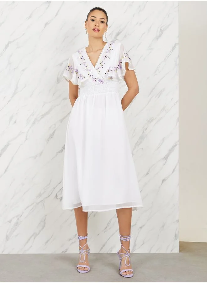 ستايلي Embroidered Cape Sleeves Aline Midi Dress