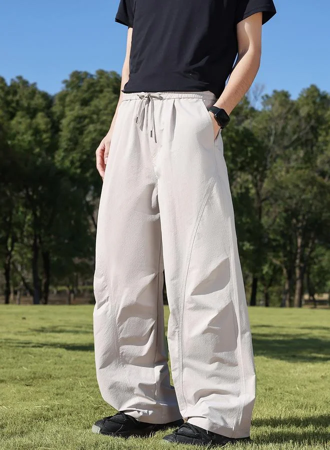 تايك تو Men Beige Pleated Wide-Leg Pants
