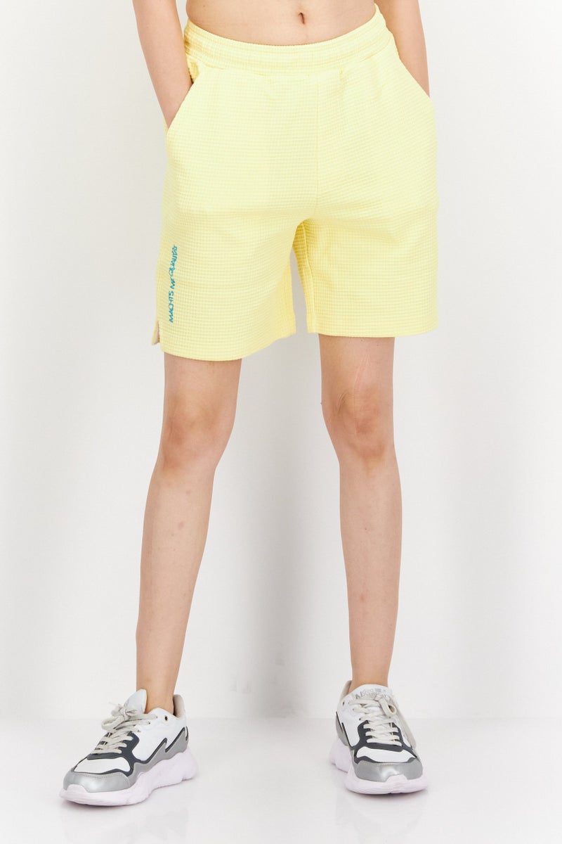 PUMA Women Sportswear Fit Plain Training Shorts, Yellow - Image 1