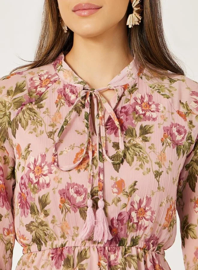 Styli Floral Print A-Line Maxi Dress with Tie-Up Neck Detail