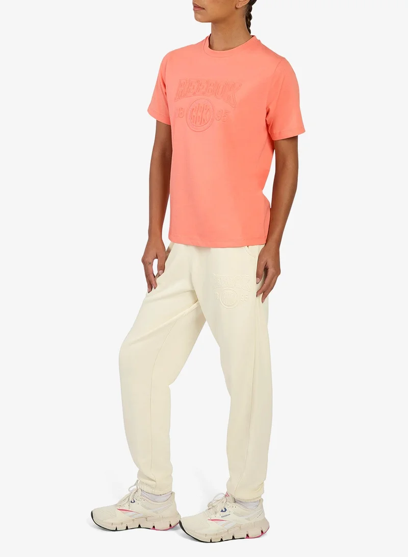 Reebok Future Peach Embossed Edge T-Shirt for Women | Best Price UAE