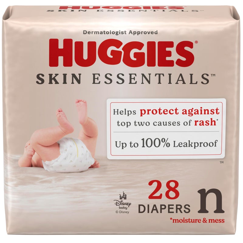 Huggies Size Newborn Diapers, Skin Essentials Baby Diapers, Size Newborn (6-9 lbs), 28 Count, Packaging May Vary - Image 1