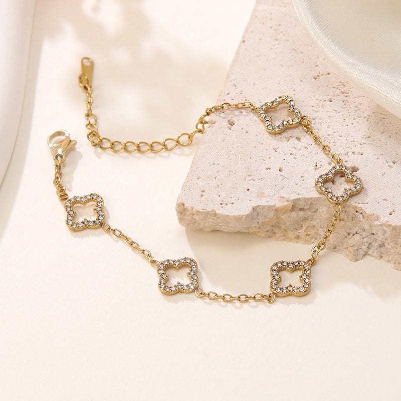 Luxury Stainless Steel Four-Leaf Clover Bracelet with 18K Gold Plating and Zirconia - Elegant, Versatile, and Trendy