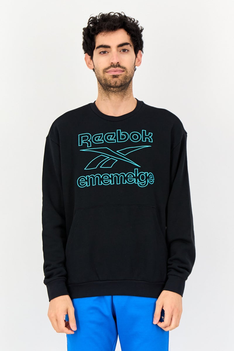 Reebok سويت شيرت رياضي للرجال بأكمام طويلة مناسب للخارج، أسود - Image 1