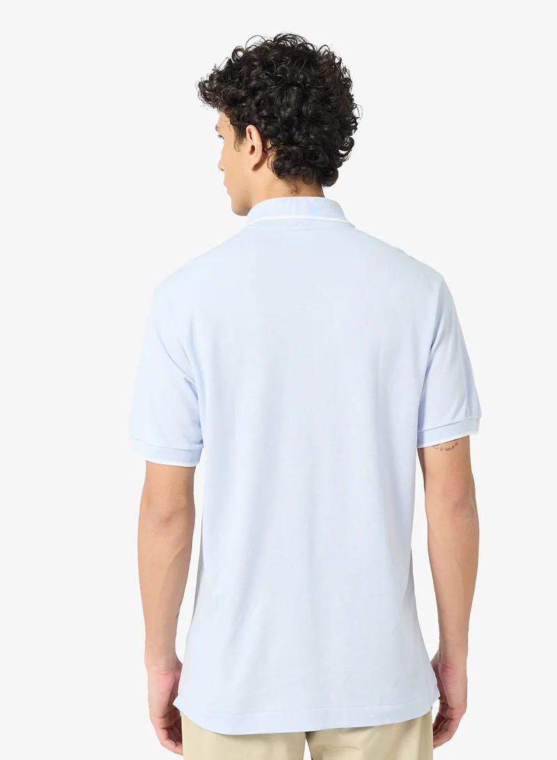 لاكوست بولو بيكيه بقصة كلاسيكية وتفاصيل جيب