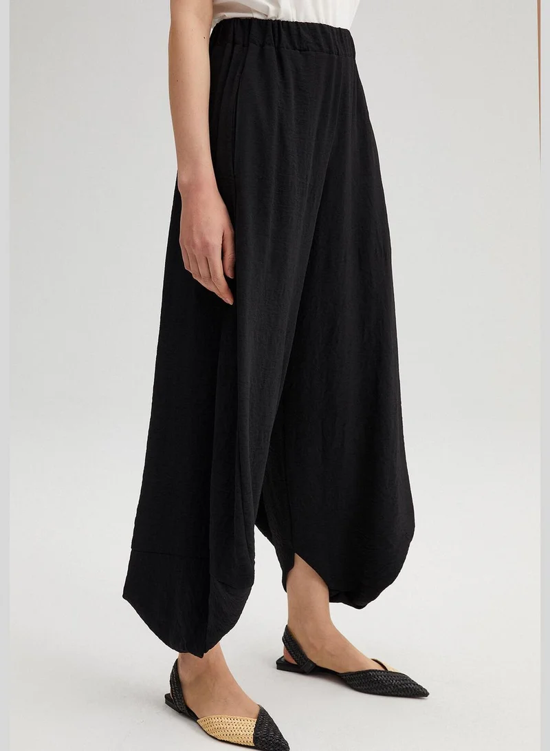 توتشي ELASTIC WAISTED BAGG TROUSERS