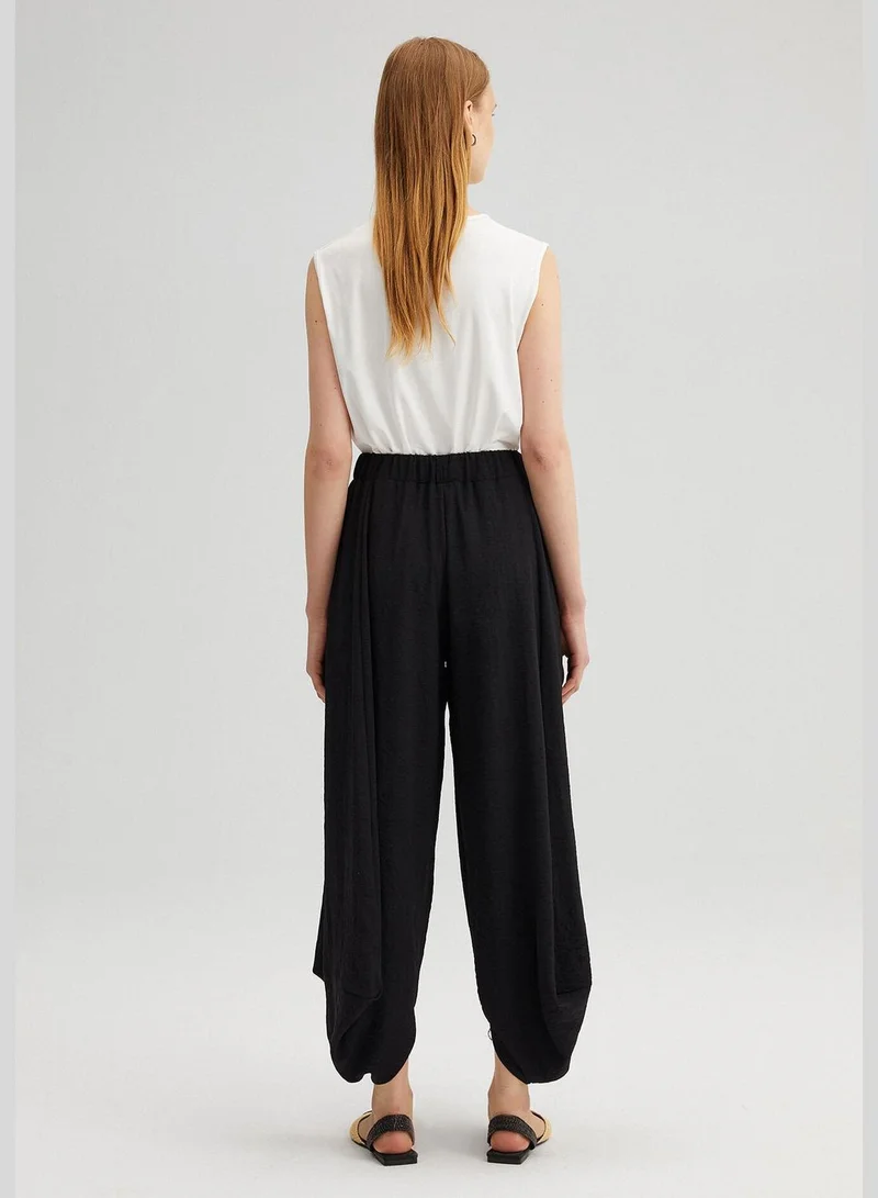 توتشي ELASTIC WAISTED BAGG TROUSERS