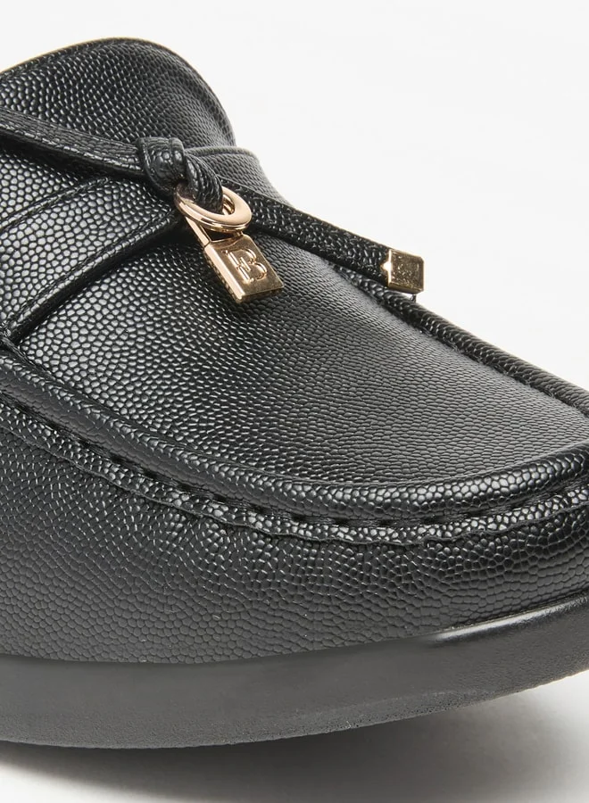 فلورا بيلا من شو إكسبرس Women's Solid Slip-On Mules with Block Heels and Tie-Up Detail