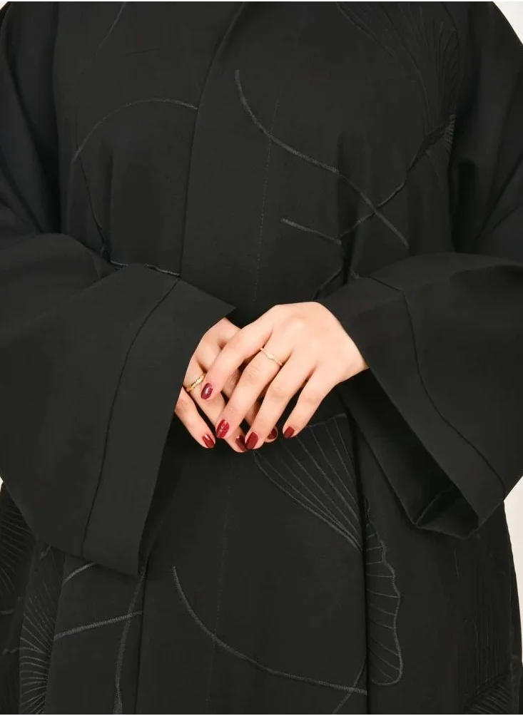 lamha abaya Black abaya, double-layered, with prominent black embroidery all over the abaya