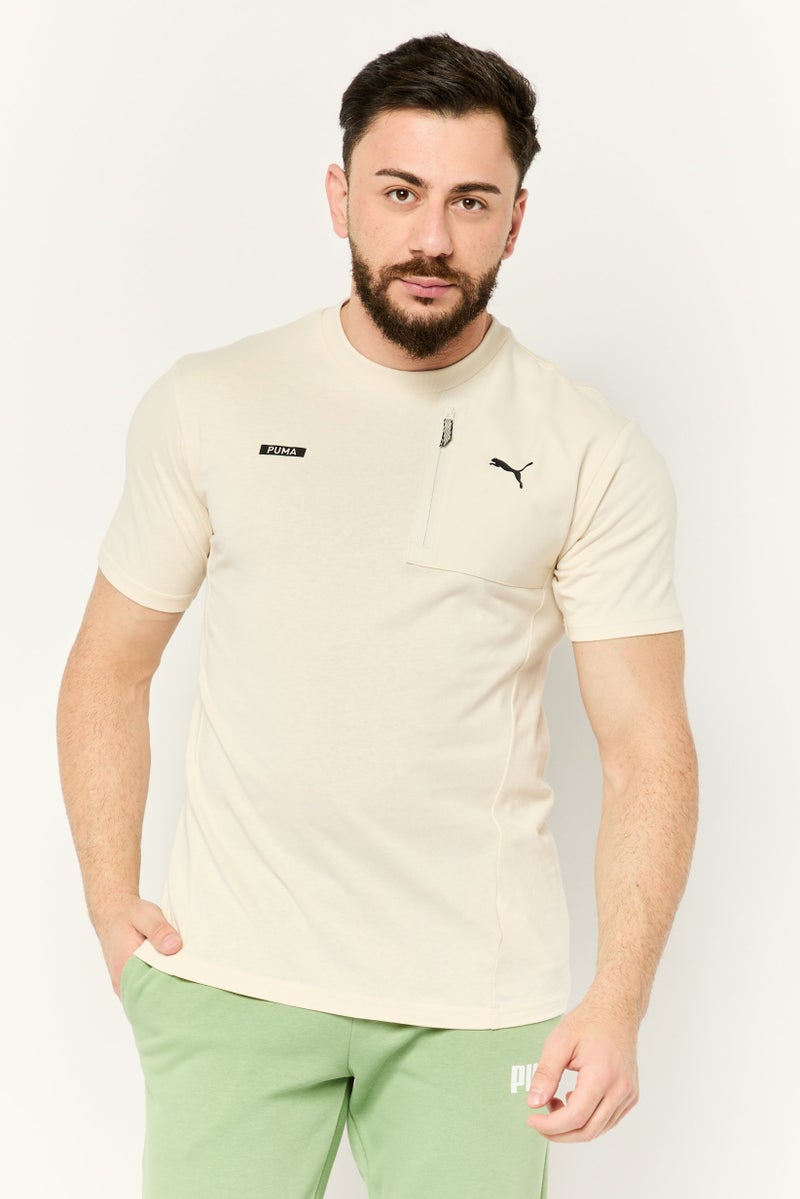 PUMA Men Sportswear Fit Short Sleeves Outdoor T-Shirt, Beige - Image 1