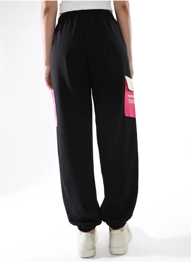 هوبرهولمي Women Track Pants in Multicolor featuring Jogger fit with a colourblocked pattern, no sleeves, regular length, secured with elasicated + drawstring closure, crafted from terry – your go-to choice for effortless elegance.