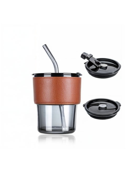 A portable glass cup for coffee and cold drinks and a leather lid with a straw