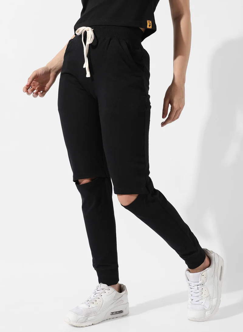 Campus Sutra Women's Solid Black Slashed-Knee Trackpants