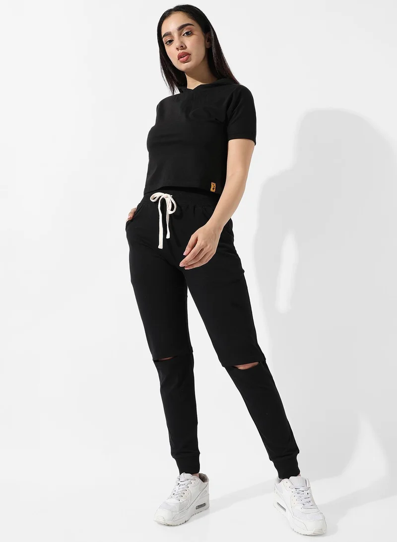Campus Sutra Women's Solid Black Slashed-Knee Trackpants