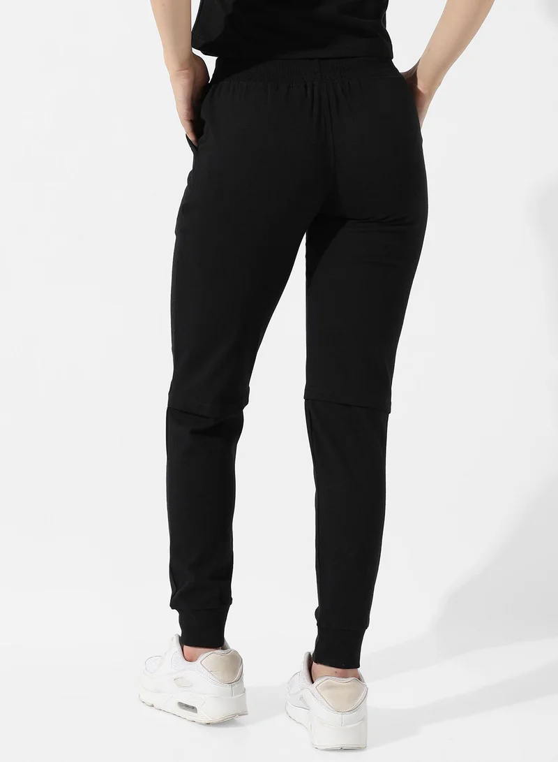 Campus Sutra Women's Solid Black Slashed-Knee Trackpants