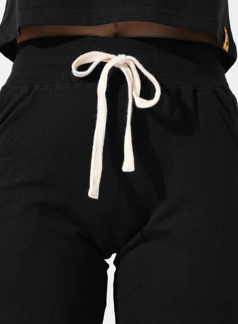 Campus Sutra Women's Solid Black Slashed-Knee Trackpants
