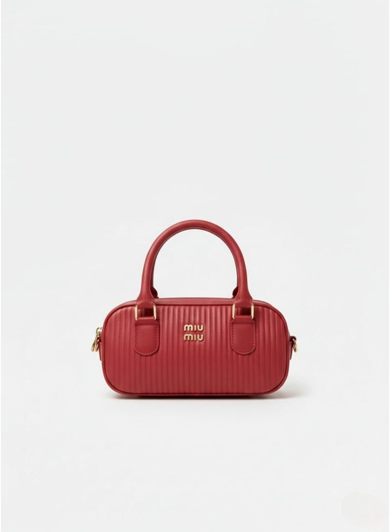 Miu Miu Women's shoulder and crossbody bag, modern practical design, versatile use. - Image 1