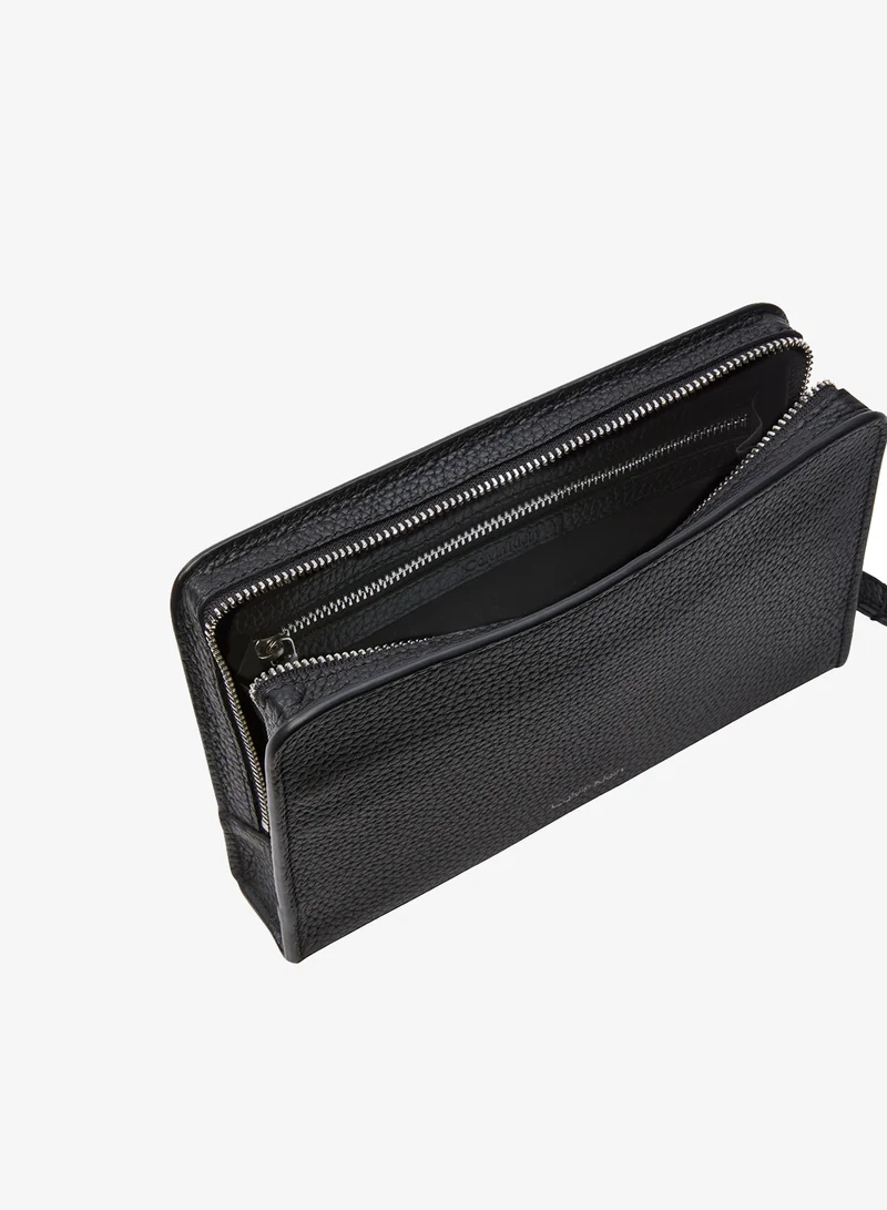 Calvin Klein Black Small Full-Grain Leather Logo Wash Bag for Men | Best Price UAE