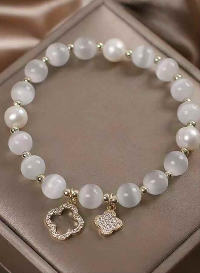 New women's four-leaf flower crystal bracelet with elastic rope and pearl lucky beads - Image 1