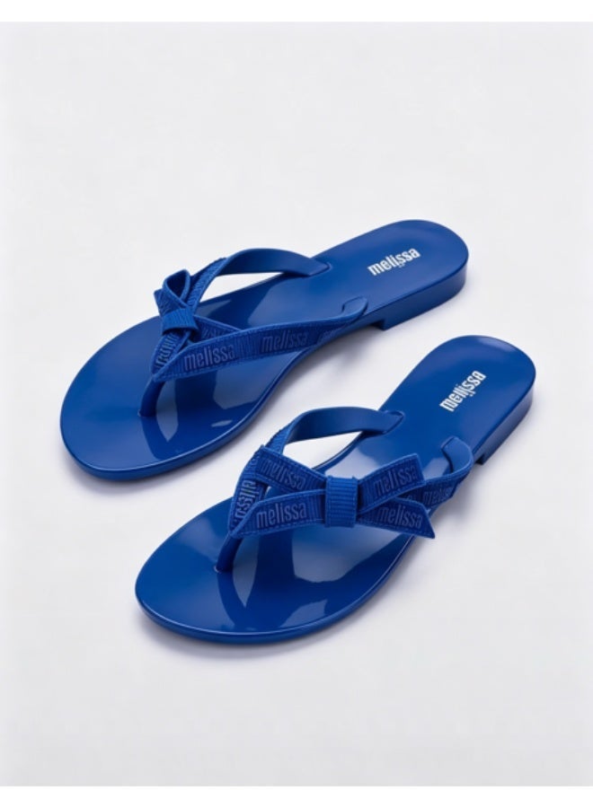 Melissa Flat Minimalist Bow Letter‑Print Flip‑Flops for Women - Image 1