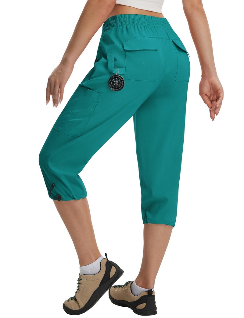 baleaf Women's Capri Pants with 7 Pockets Lightweight Quick Dry Water Resistant Hiking Travel Summer Capris Cargo Cropped Pants for Women Green L - Image 1
