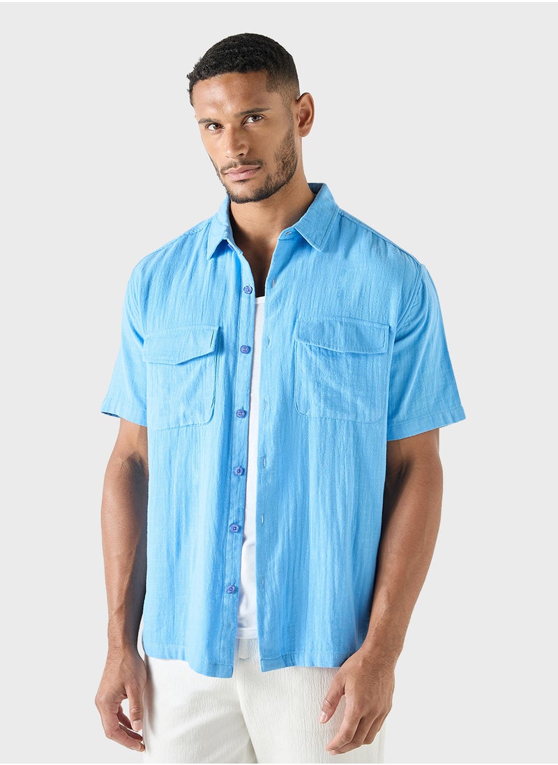 Iconic Textured Shirt with Short Sleeves and Front Pocket  - Image 1