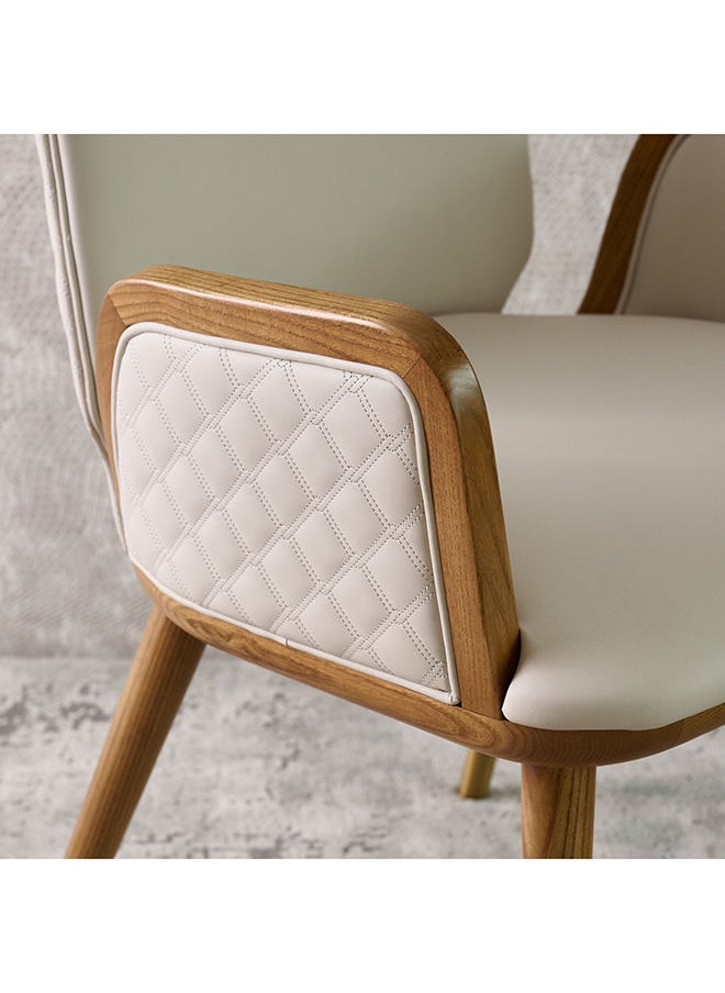 AL HUZAIFA FURNITURE - Capri Dining Chair Upholstered In Pvc Leather Quilted Design Walnut American Ashwood Legs - Image 1