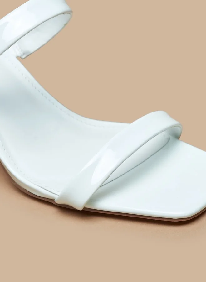 Celeste Women's Slip-On Sandal with Block Heel