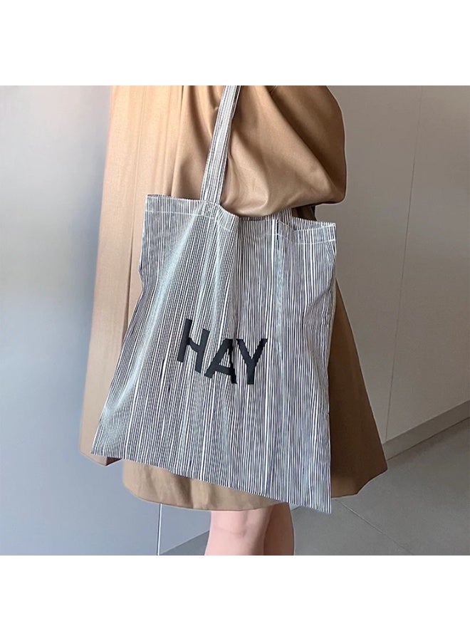 Lightweight Flat Cotton Tote Bag with Fine Pinstripe Pattern & Bold "HAY" Letter Print – Minimalist Scandinavian-Style Shoulder Bag for Women | Ultra-Thin, Foldable & Reusable Everyday Carry Bag for Shopping, Books, University, Travel & Daily Use | Eco-Friendly Slim Canvas Shopper Bag with Long Handles | Black & White Striped Design - Image 1
