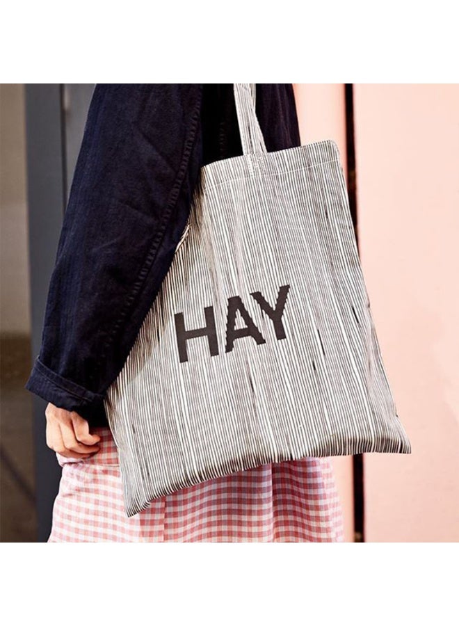Lightweight Flat Cotton Tote Bag with Fine Pinstripe Pattern & Bold "HAY" Letter Print – Minimalist Scandinavian-Style Shoulder Bag for Women | Ultra-Thin, Foldable & Reusable Everyday Carry Bag for Shopping, Books, University, Travel & Daily Use | Eco-Friendly Slim Canvas Shopper Bag with Long Handles | Black & White Striped Design - Image 3