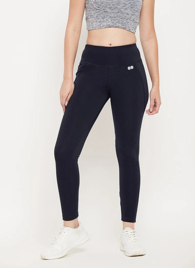 Clovia Clovia Snug Fit Active Tights in Navy with Reflective Logo
