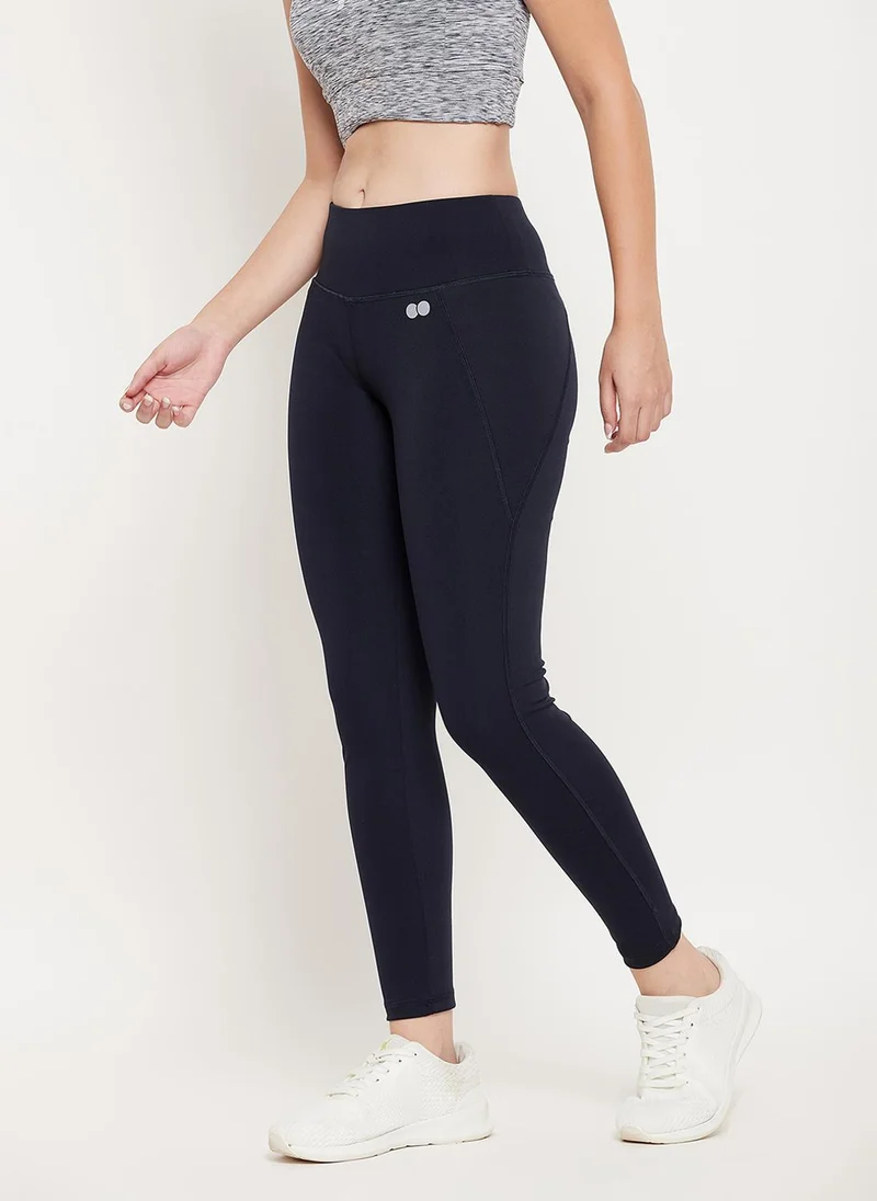 Clovia Clovia Snug Fit Active Tights in Navy with Reflective Logo