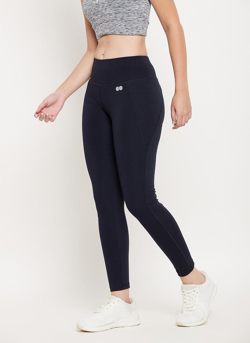 Clovia Snug Fit Active Tights in Navy with Reflective Logo - Image 4