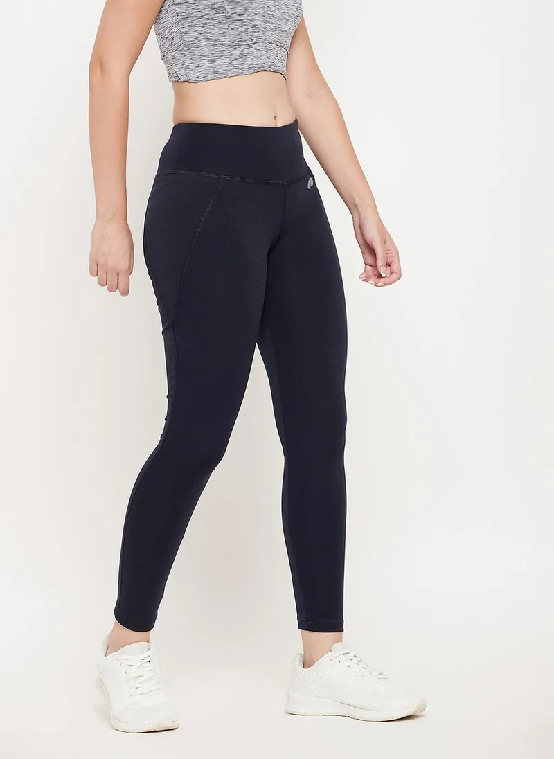 Clovia Clovia Snug Fit Active Tights in Navy with Reflective Logo