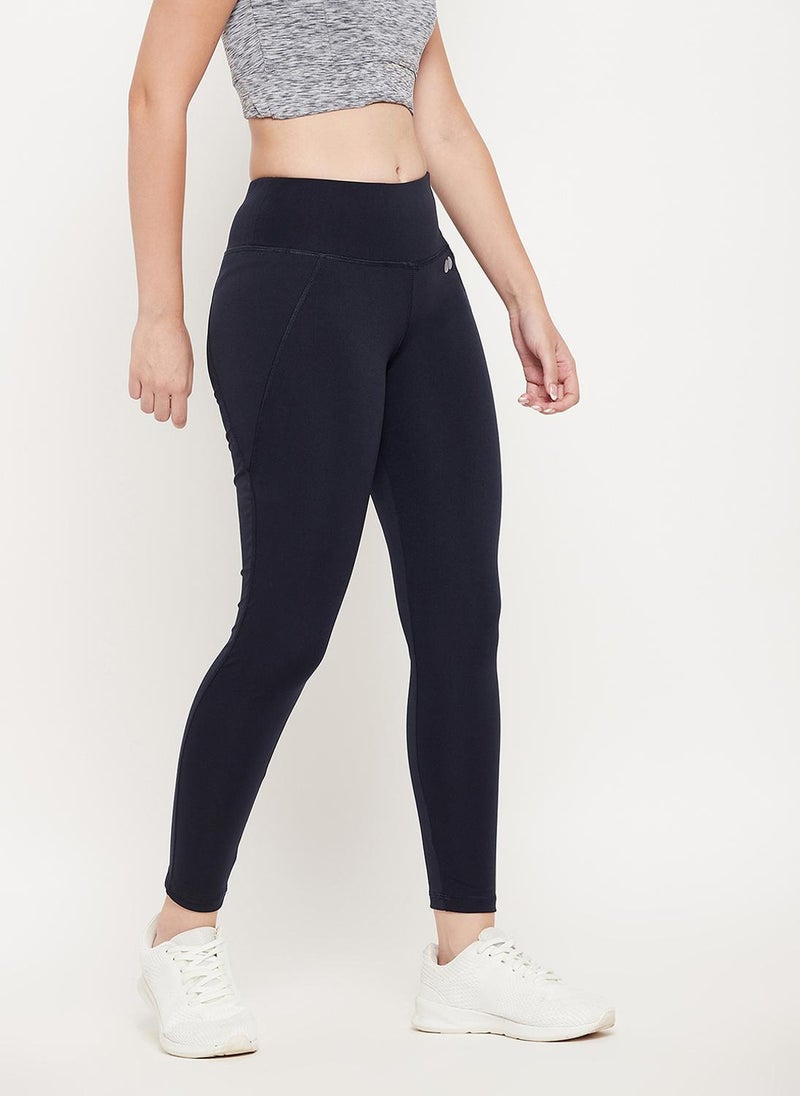 Clovia Snug Fit Active Tights in Navy with Reflective Logo - Image 5