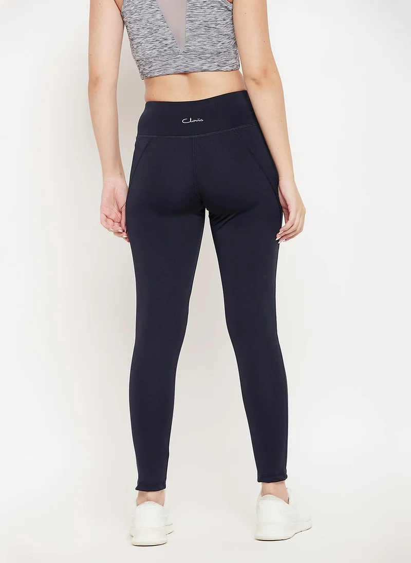 Clovia Clovia Snug Fit Active Tights in Navy with Reflective Logo