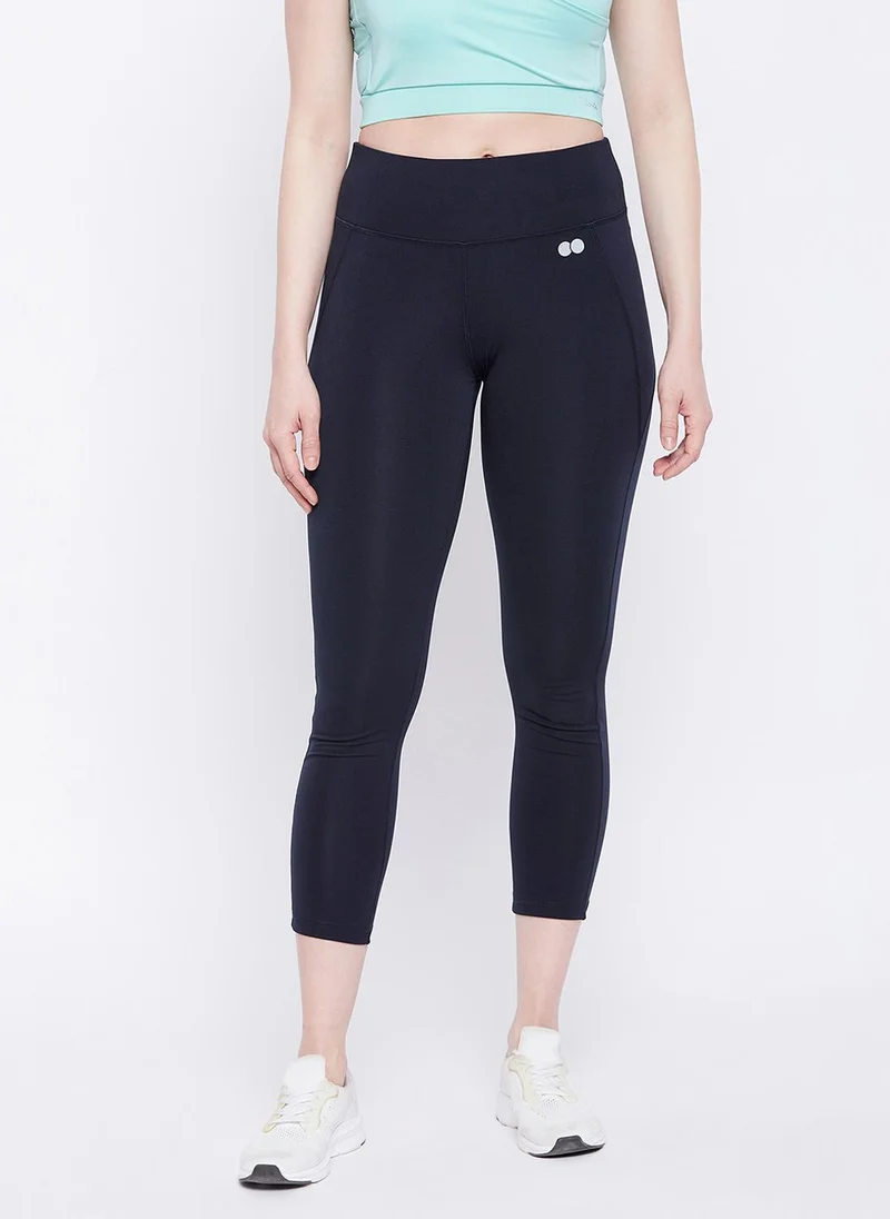Clovia Clovia Snug Fit Active Tights in Navy with Reflective Logo