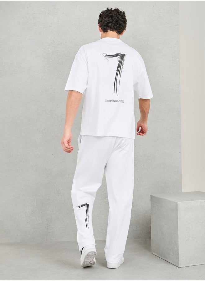 Styli Back Contrast 7 Print Oversized T-shirt and Open Hem Jogger Interlock Co-ords  - Image 1