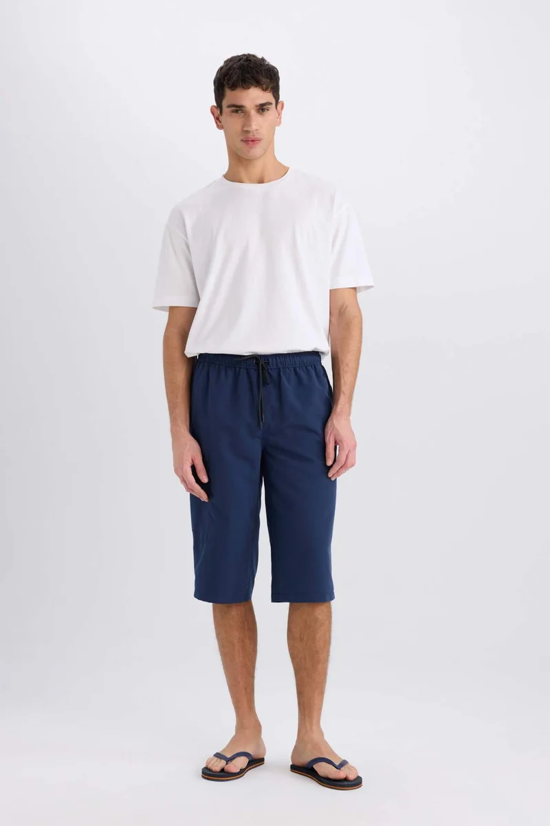 ديفاكتو Long Fit Mesh Lined Long Swim Shorts