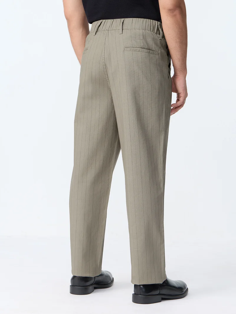 The Souled Store  The Souled Store Pleated Striper Pants: Khaki Men and Boys Pinstripe Poly-Viscose Blend Straight Fit Pleated Front Elastic Back Waistband Trousers  | Best Price UAE