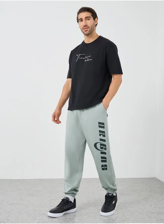 ستايلي Styli Textured Slogan Print Oversized Joggers