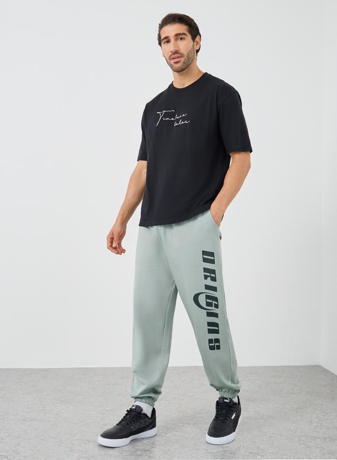 Styli Styli Textured Slogan Print Oversized Joggers  - Image 2