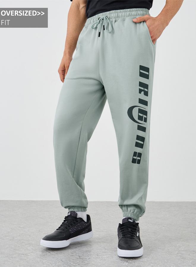 Styli Styli Textured Slogan Print Oversized Joggers  - Image 1