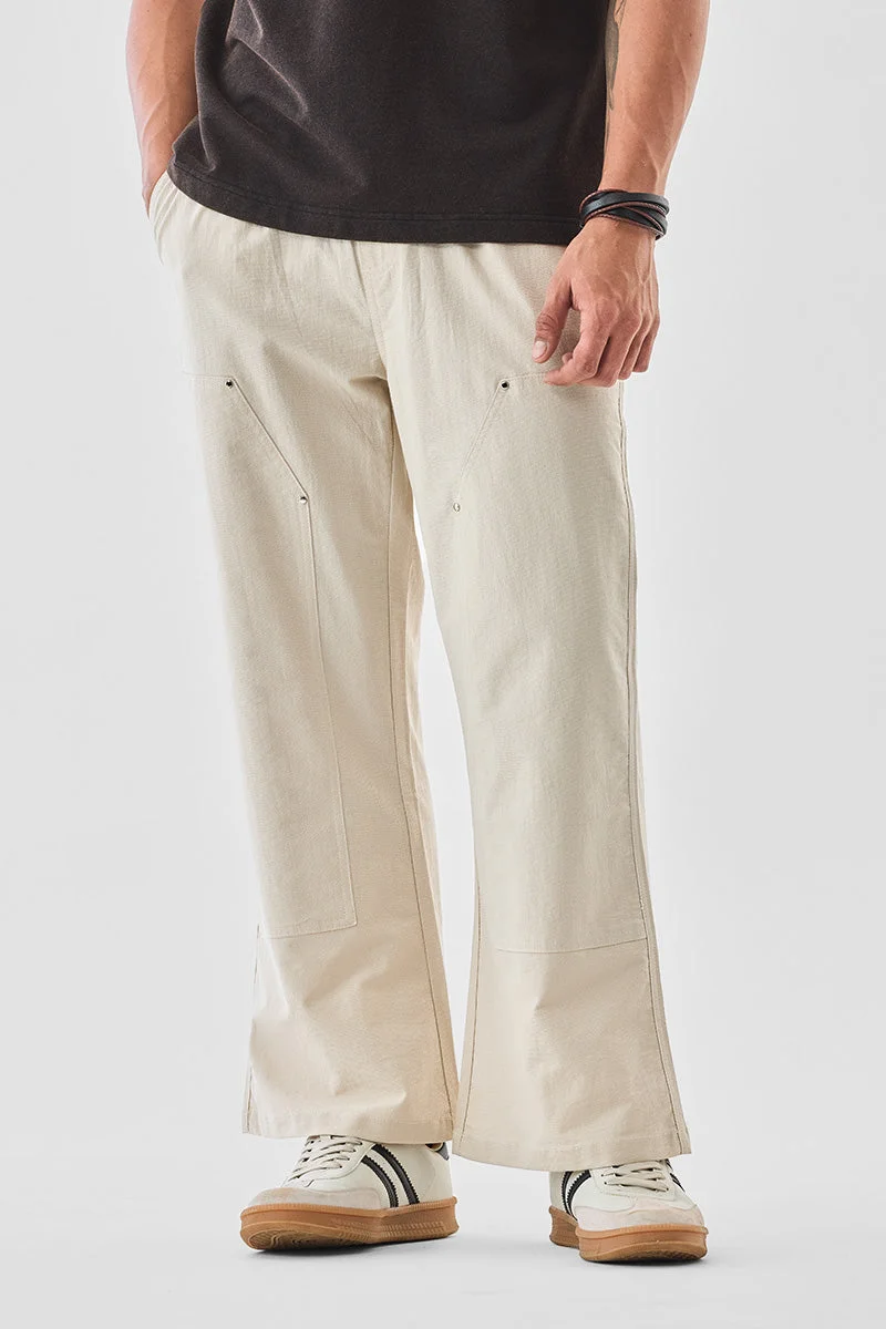 SNITCH بنطلون واسع بخصر مطاطي وحبل سحب